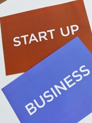 pexels photo 8373815 8373815 Two colorful placards with 'START UP' and 'BUSINESS' to symbolize modern entrepreneurship.